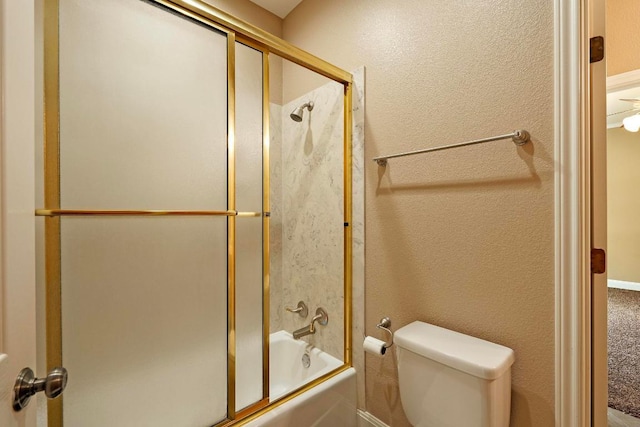 1806 Carey Ave, Taylor, TX 76574 - bathroom with combined bath / shower with glass door and toilet