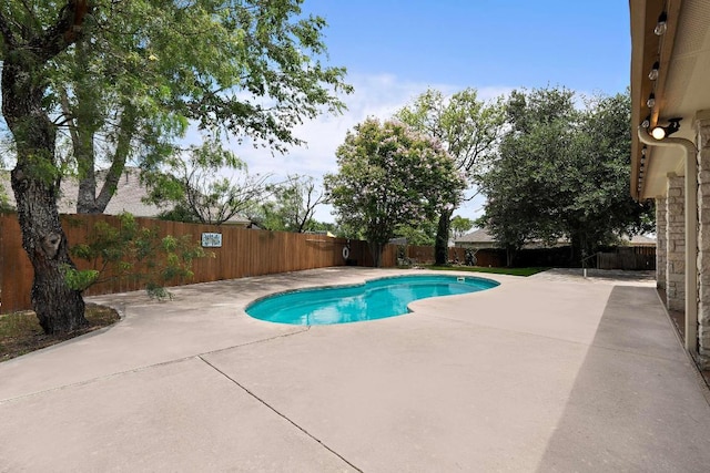 1806 Carey Ave, Taylor, TX 76574 - view of pool with a patio area and a fenced backyard