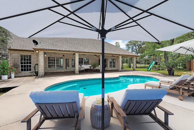 1806 Carey Ave, Taylor, TX 76574 - outdoor pool with a playground, french doors, a patio area, and a wooden deck