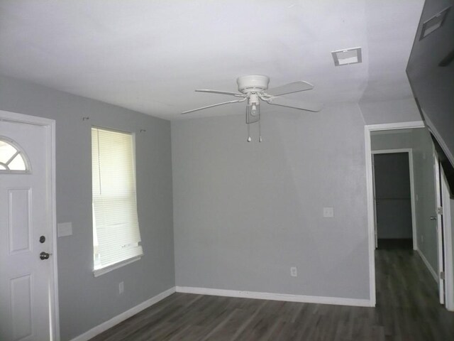502 Ross St, Smithville, TX 78957 - entryway featuring dark wood-style flooring, a ceiling fan, and plenty of natural light