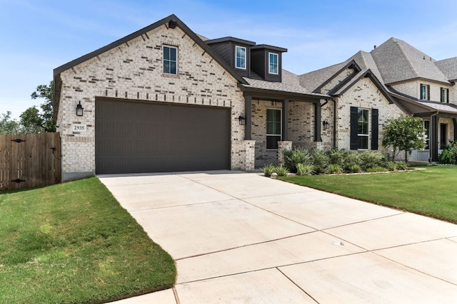 2935 Mckinnie Park, Bulverde, TX 78163 - view of front of property with driveway, brick siding, an attached garage, and a shingled roof