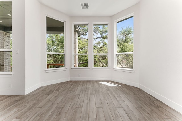 2935 Mckinnie Park, Bulverde, TX 78163 - spare room featuring wood finished floors and baseboards