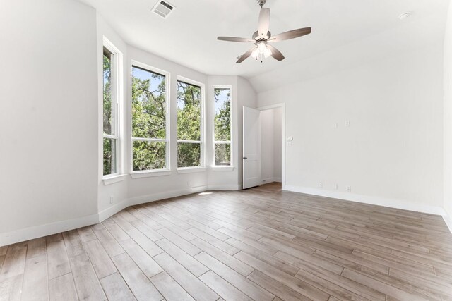 2935 Mckinnie Park, Bulverde, TX 78163 - empty room with ceiling fan and light wood finished floors