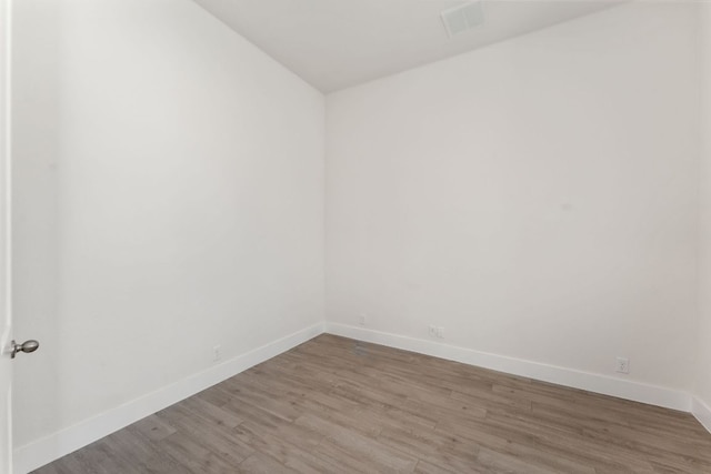 2935 Mckinnie Park, Bulverde, TX 78163 - empty room with wood finished floors and vaulted ceiling