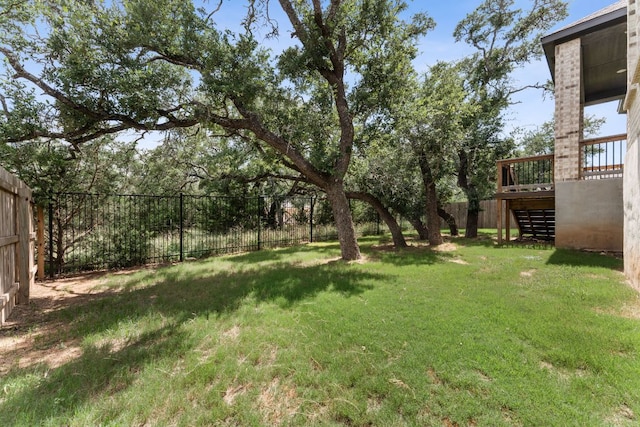 2935 Mckinnie Park, Bulverde, TX 78163 - fenced backyard with stairway and a wooden deck