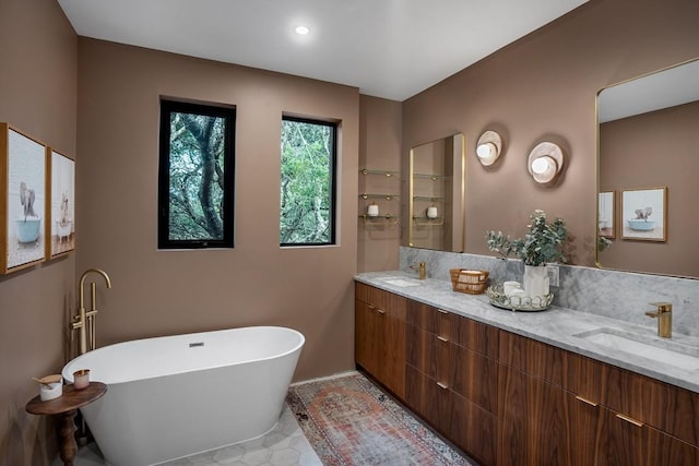 1001 Madrone Rd, West Lake Hills, TX 78746 - bathroom with double vanity, a soaking tub, and tile patterned flooring