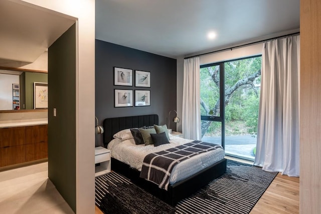 1001 Madrone Rd, West Lake Hills, TX 78746 - bedroom featuring access to outside and wood finished floors