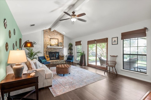 225 Spanish Oak Dr, Georgetown, TX 78628 - living room featuring wood finished floors, a ceiling fan, and a brick fireplace