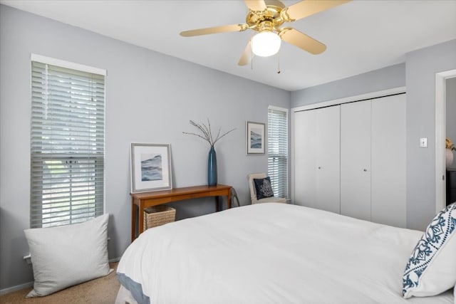 225 Spanish Oak Dr, Georgetown, TX 78628 - bedroom with a closet, a ceiling fan, and carpet floors
