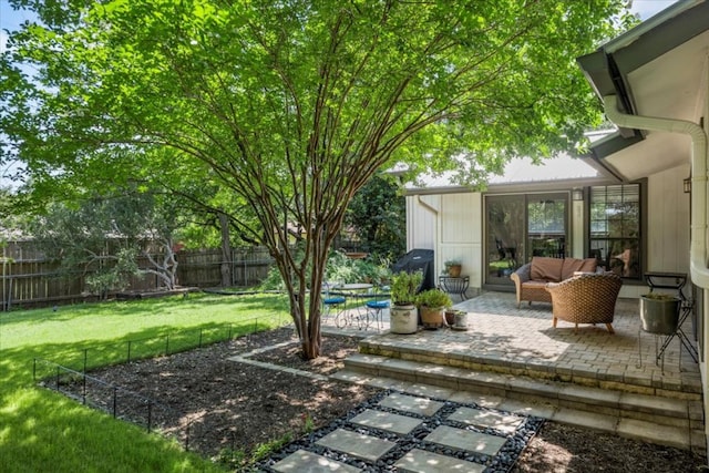 225 Spanish Oak Dr, Georgetown, TX 78628 - fenced backyard with a patio area
