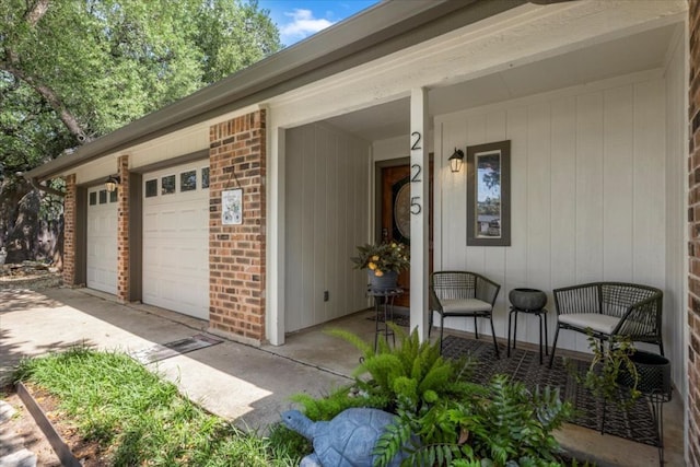 225 Spanish Oak Dr, Georgetown, TX 78628 - entrance to property with brick siding, a garage, and driveway