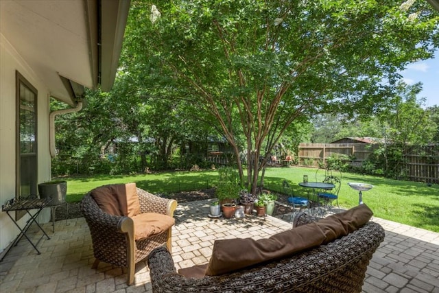 225 Spanish Oak Dr, Georgetown, TX 78628 - fenced backyard featuring a patio