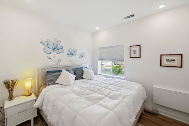 4802 S Congress Ave Unit 215, Austin, TX 78745 - bedroom featuring wood finished floors and recessed lighting