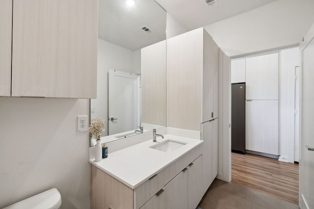 4802 S Congress Ave Unit 215, Austin, TX 78745 - bathroom featuring vanity and tile patterned floors