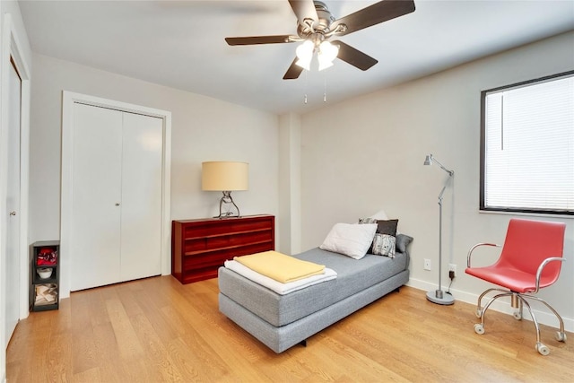 40 N Interstate 35 Hwy Unit 5B2, Austin, TX 78701 - bedroom with wood finished floors, a closet, and ceiling fan