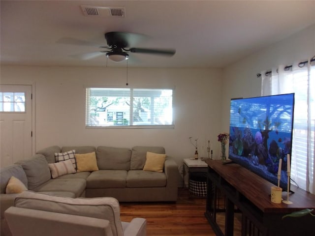 905 W Live Oak St, Austin, TX 78704 - living area featuring wood finished floors and ceiling fan