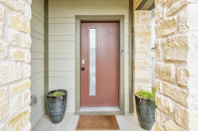 7713 Saddle Up Dr, Austin, TX 78724 - doorway to property featuring stone siding and elevator