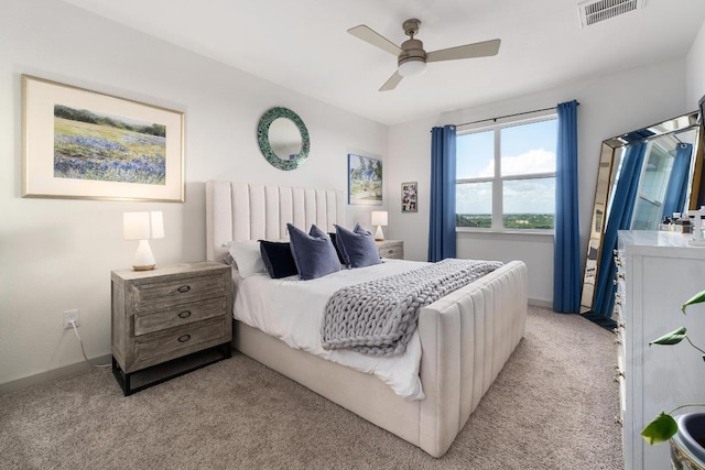 7713 Saddle Up Dr, Austin, TX 78724 - bedroom with light colored carpet and a ceiling fan