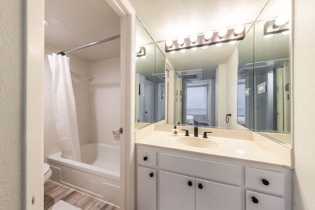 1212 Guadalupe St Unit 301, Austin, TX 78701 - full bathroom featuring shower / bath combination with curtain, vanity, and wood finished floors