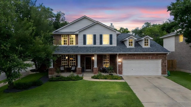 1600 Grand Falls Dr, Cedar Park, TX 78613 - view of front facade featuring a porch, brick siding, a garage, concrete driveway, and a chimney