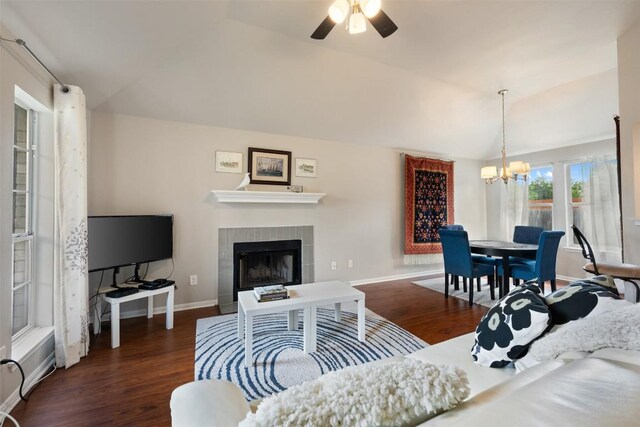 2004 Yaupon Trl, Cedar Park, TX 78613 - living area featuring a chandelier, wood finished floors, vaulted ceiling, a fireplace, and a ceiling fan