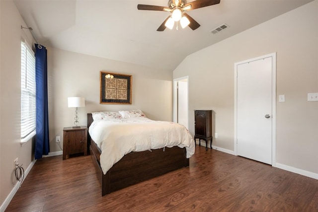 2004 Yaupon Trl, Cedar Park, TX 78613 - bedroom with vaulted ceiling, wood finished floors, multiple windows, and a ceiling fan