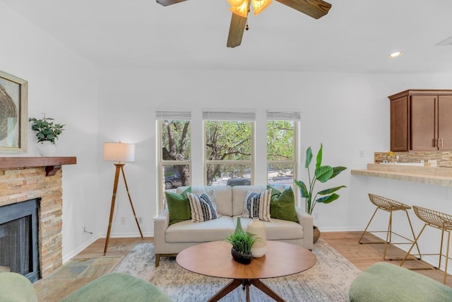2414 Longview St Unit 101, Austin, TX 78705 - living area featuring a fireplace, a ceiling fan, and recessed lighting