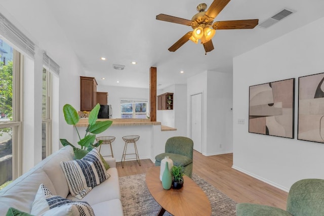 2414 Longview St Unit 101, Austin, TX 78705 - living area with light wood-type flooring, ceiling fan, and recessed lighting