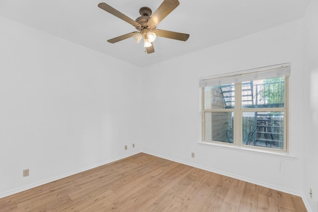 2414 Longview St Unit 101, Austin, TX 78705 - empty room with light wood finished floors and ceiling fan