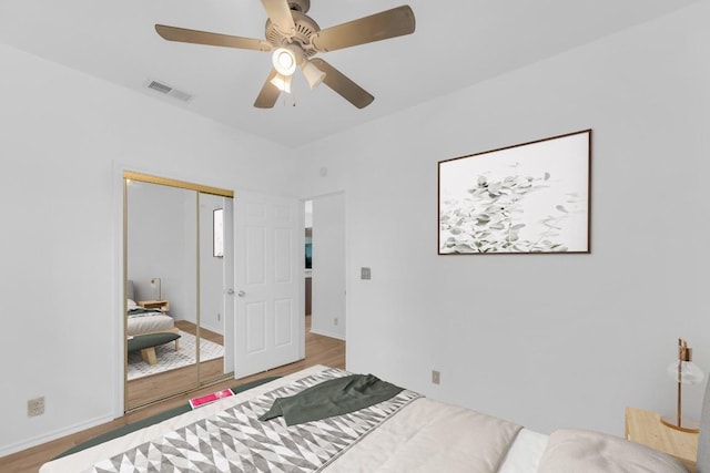 2414 Longview St Unit 101, Austin, TX 78705 - bedroom featuring wood finished floors, a closet, and ceiling fan
