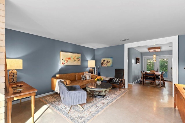 1214 Arthur Stiles Rd, Austin, TX 78721 - living area with concrete floors and baseboards