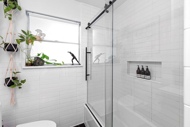 1214 Arthur Stiles Rd, Austin, TX 78721 - full bathroom with bath / shower combo with glass door and toilet