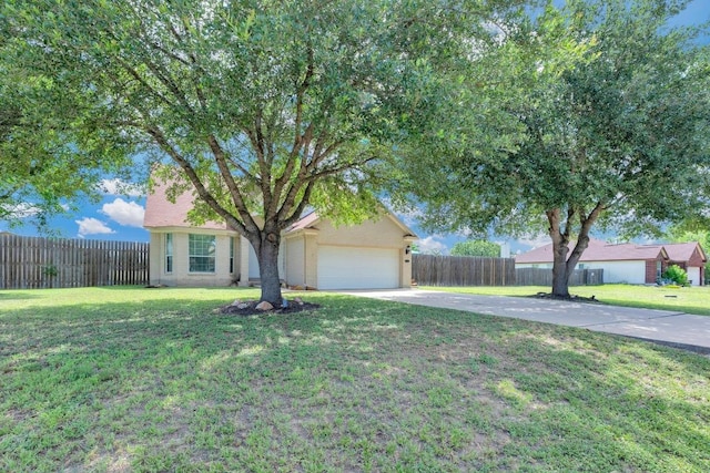 131 Martin Crossing Dr, Cedar Creek, TX 78612 - view of front facade with driveway and an attached garage