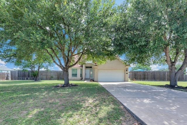 131 Martin Crossing Dr, Cedar Creek, TX 78612 - obstructed view of property featuring an attached garage and concrete driveway