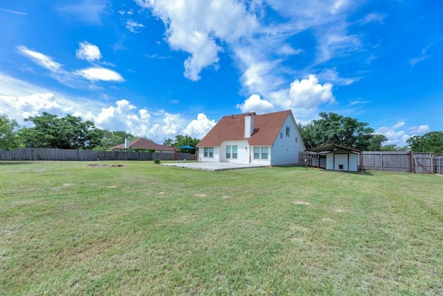 131 Martin Crossing Dr, Cedar Creek, TX 78612 - back of house with a patio and a fenced backyard