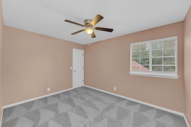 131 Martin Crossing Dr, Cedar Creek, TX 78612 - carpeted empty room with a ceiling fan and baseboards