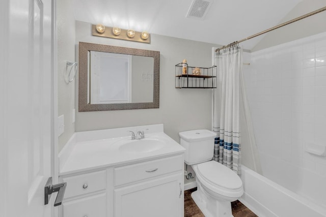 131 Martin Crossing Dr, Cedar Creek, TX 78612 - bathroom featuring vanity, shower / tub combo with curtain, and wood finished floors