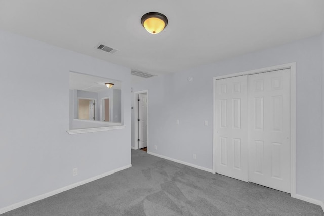 131 Martin Crossing Dr, Cedar Creek, TX 78612 - unfurnished bedroom with carpet and a closet