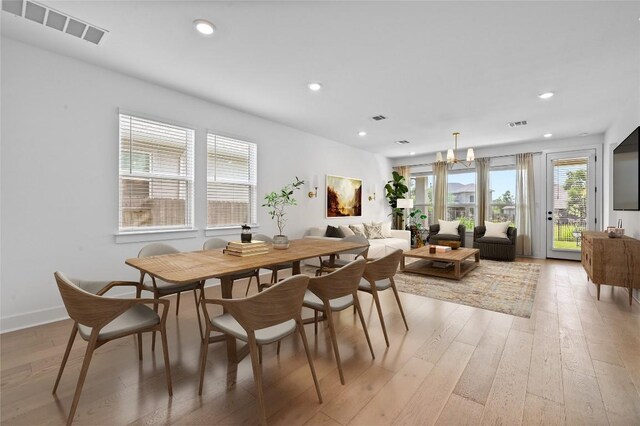 149 Beryl Way, Dripping Springs, TX 78620 - dining room with light wood-style floors and recessed lighting