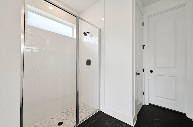 149 Beryl Way, Dripping Springs, TX 78620 - bathroom with a shower stall and marble finish flooring