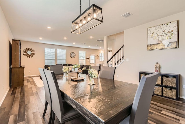 501 Goat Willow Ln, Georgetown, TX 78626 - dining space with wood finished floors, recessed lighting, stairway, and a chandelier