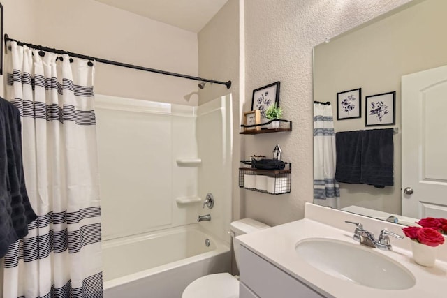 501 Goat Willow Ln, Georgetown, TX 78626 - bathroom featuring a textured wall, shower / bath combo, and vanity