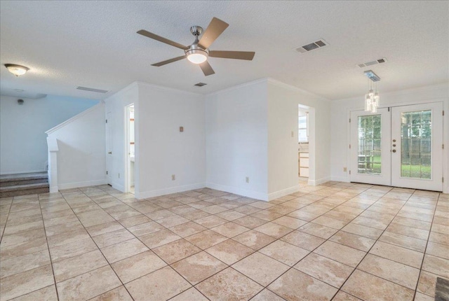 1705 Timberwood Dr, Cedar Park, TX 78613 - empty room with crown molding, a textured ceiling, stairs, light tile patterned floors, and ceiling fan