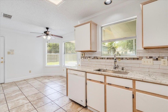 1705 Timberwood Dr, Cedar Park, TX 78613 - kitchen featuring dishwasher, plenty of natural light, a ceiling fan, crown molding, and decorative backsplash