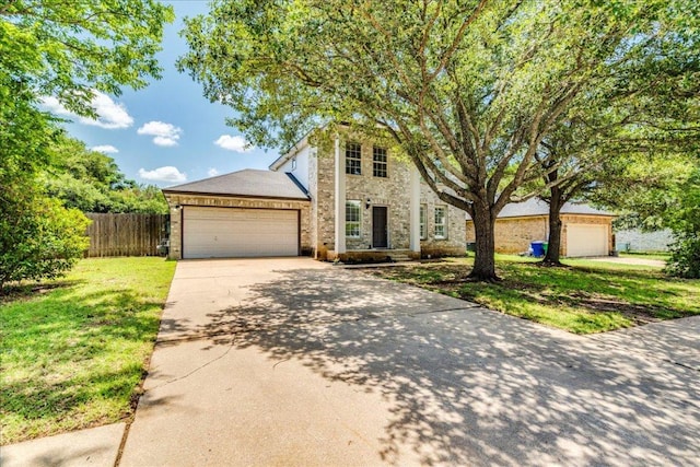 1705 Timberwood Dr, Cedar Park, TX 78613 - view of front of house featuring concrete driveway, an attached garage, and brick siding