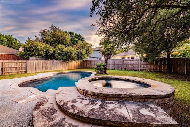1705 Timberwood Dr, Cedar Park, TX 78613 - pool at dusk with a fenced backyard and a pool with connected hot tub