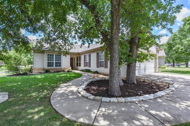205 Monarch Trl, Georgetown, TX 78633 - ranch-style home with stucco siding, driveway, a front lawn, and a garage