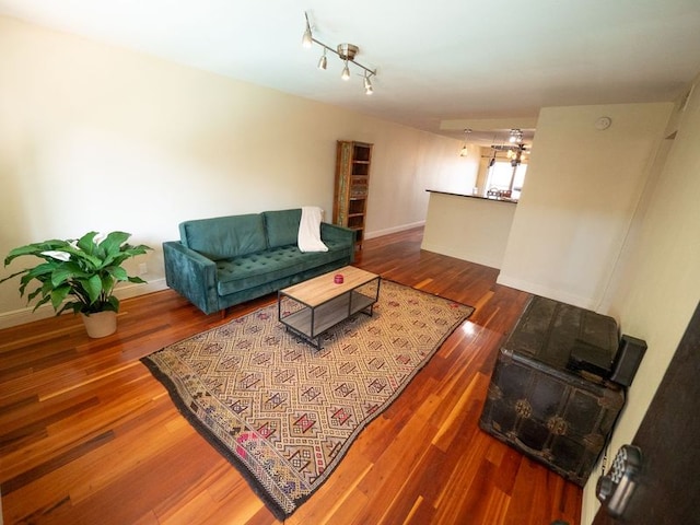 2303 Eastside Dr # 209, Austin, TX 78704 - living room with wood finished floors and baseboards