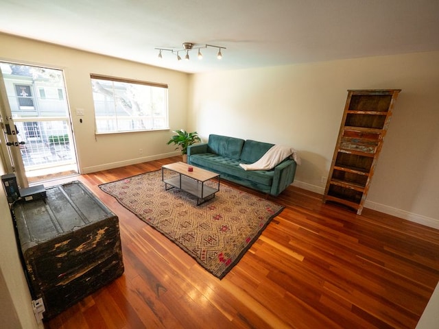 2303 Eastside Dr # 209, Austin, TX 78704 - living room featuring wood finished floors and baseboards