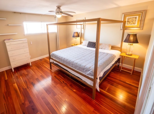 2303 Eastside Dr # 209, Austin, TX 78704 - bedroom featuring wood finished floors and ceiling fan